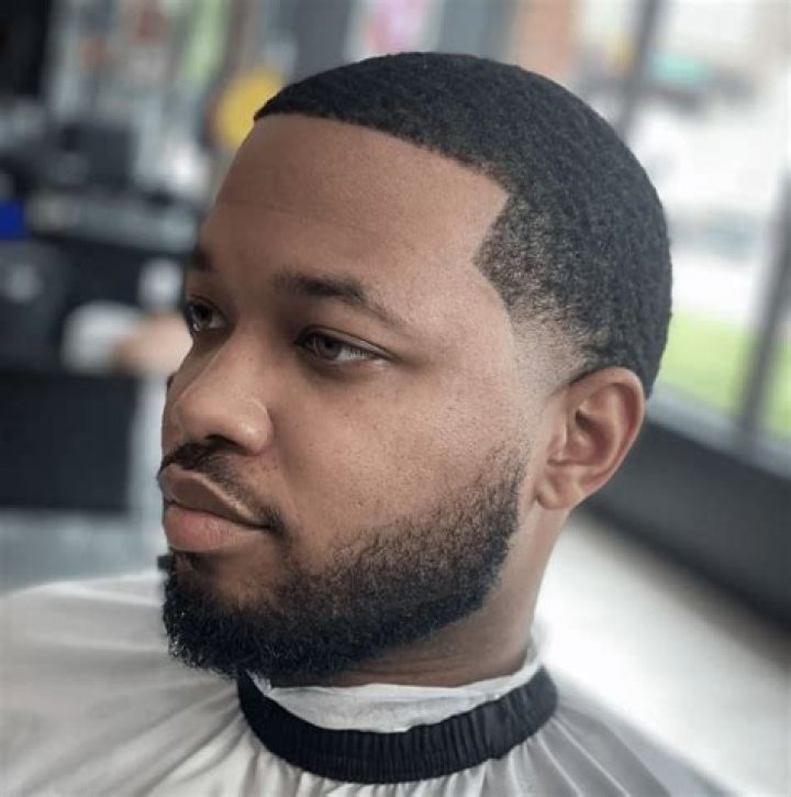 Sleek and Sophisticated: The Low Taper Fade for Black Men